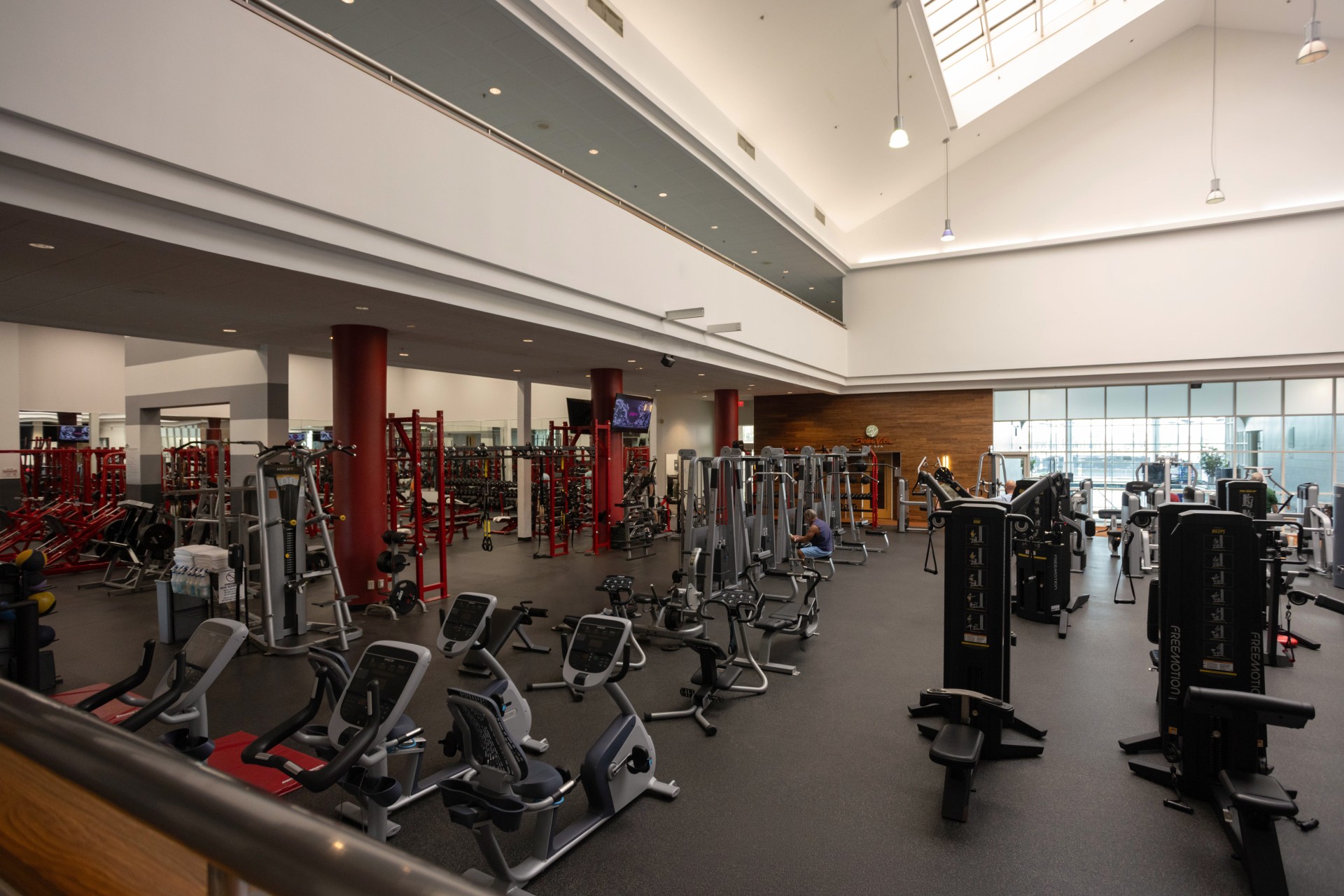 a large gym with exercise equipment