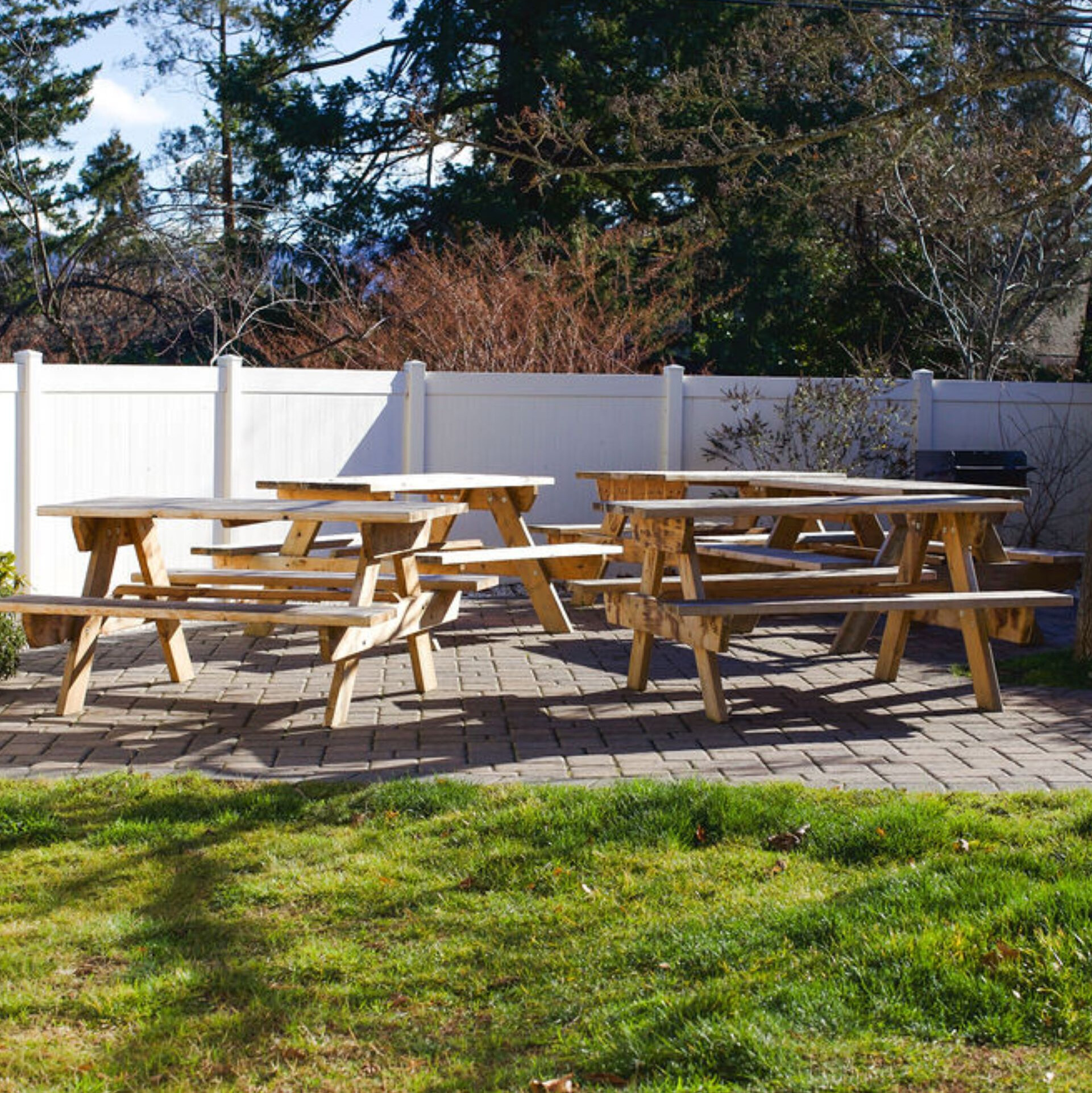 a group of picnic tables outside