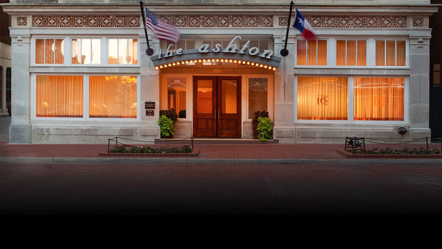 a building with flags on the front