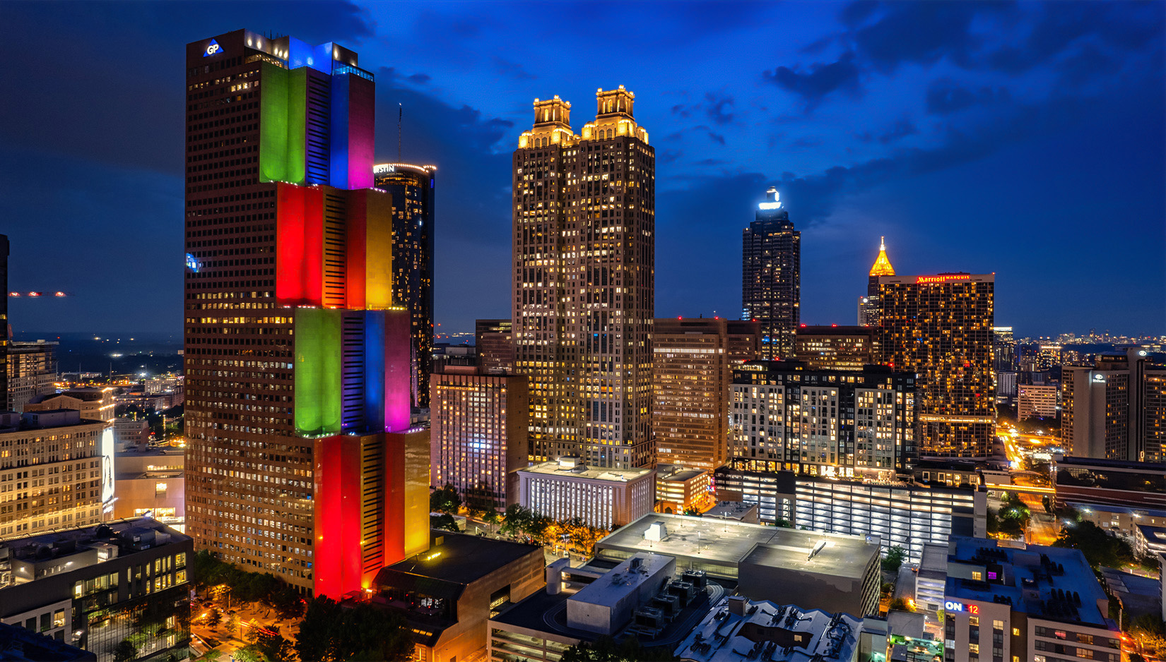 a city skyline with many tall buildings