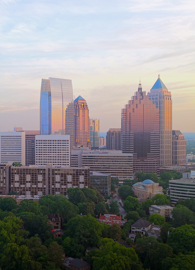 a city skyline with many tall buildings