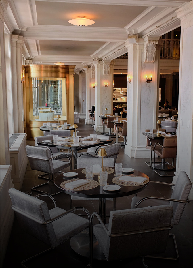 a restaurant with tables and chairs