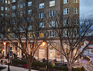 a building with trees in front of it