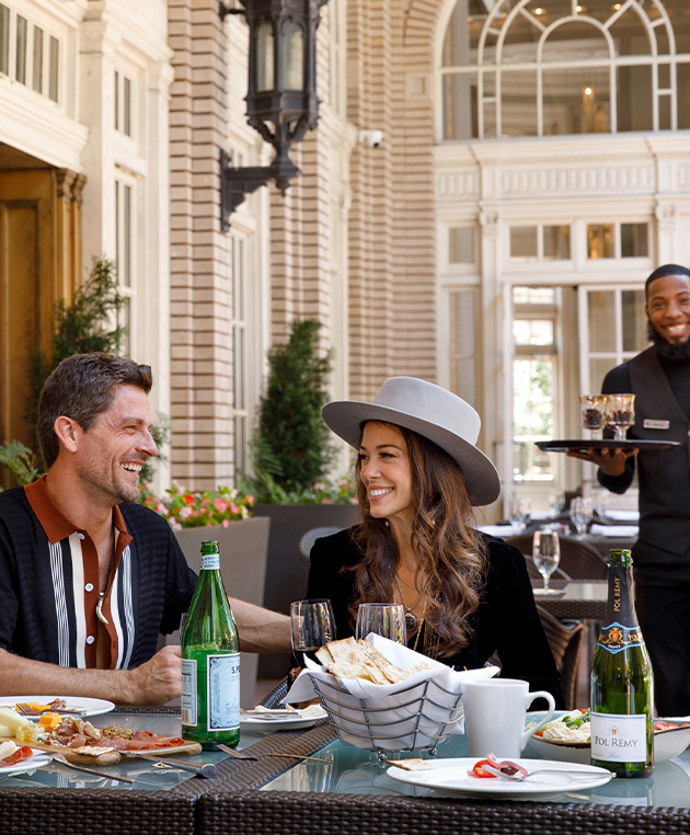 a group of people sitting at a table