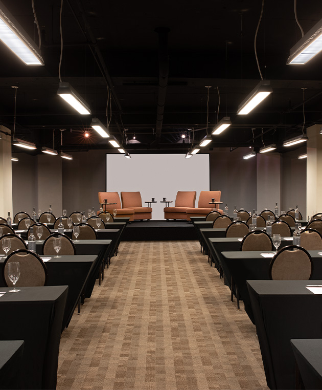 a room with chairs and tables