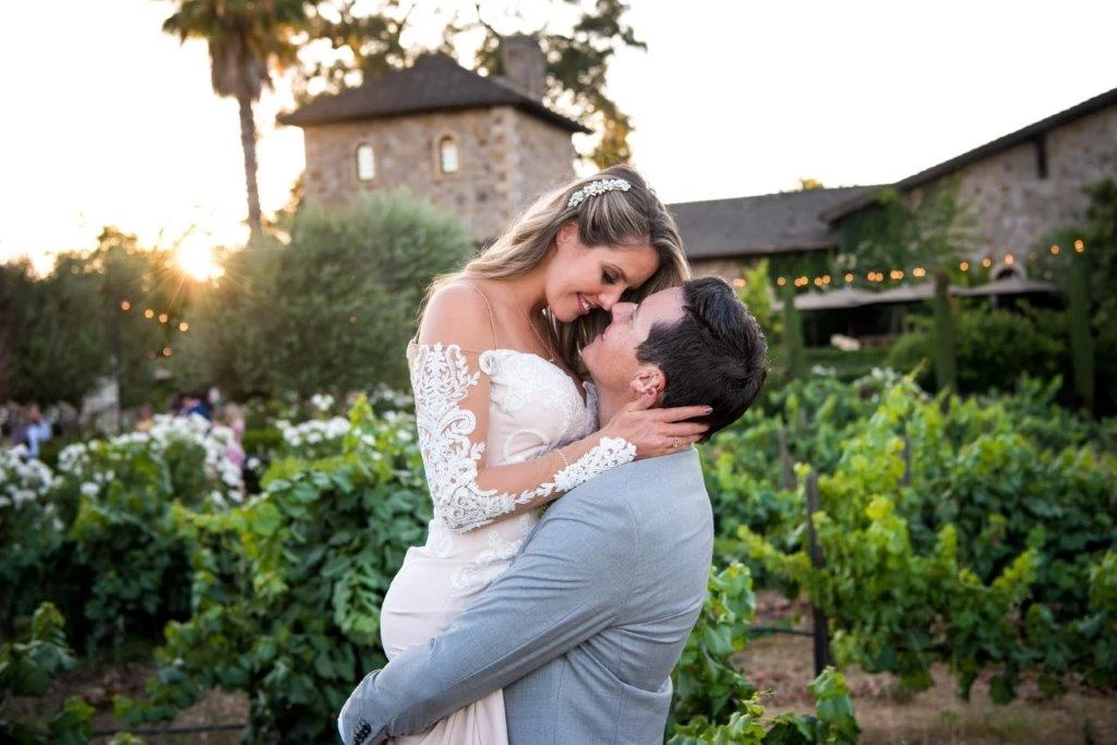 a man and woman in a garden