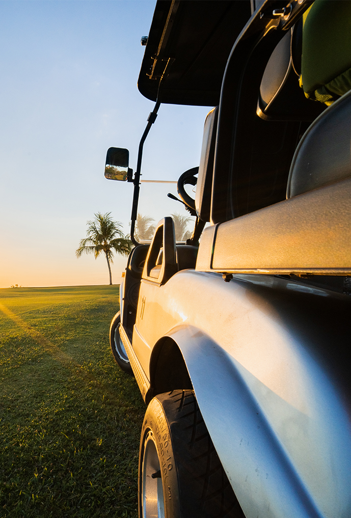 a golf cart parked on a golf course