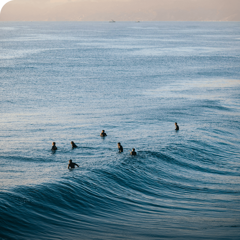 a group of people in the water