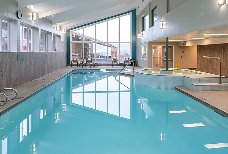 a swimming pool in a large room