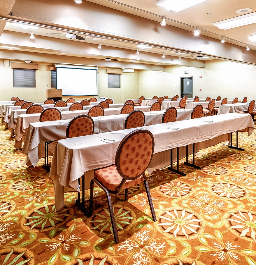 a room with tables and chairs