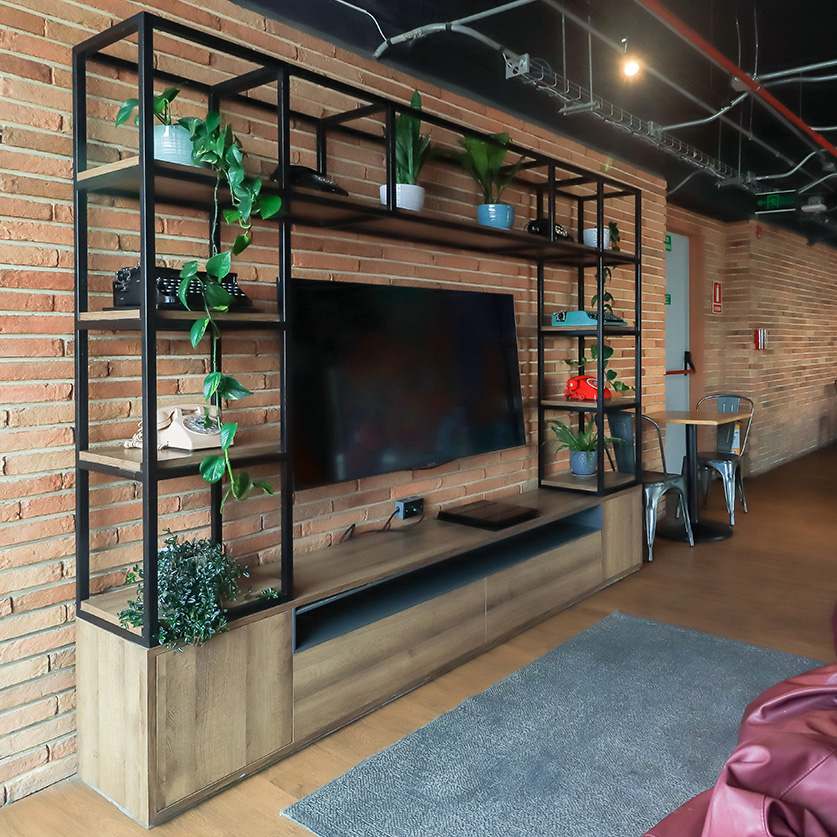 a tv on a shelf in a room