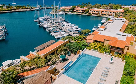 a swimming pool and a marina with boats