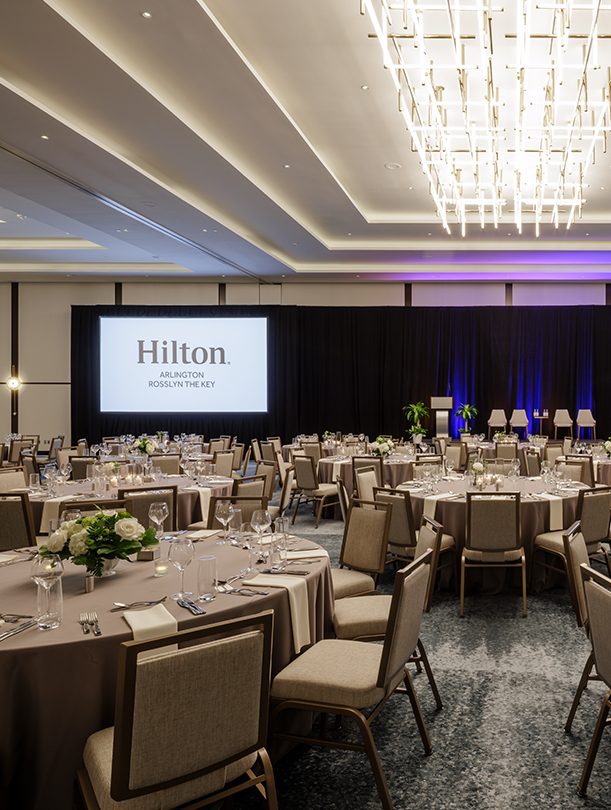 a large room with tables and chairs
