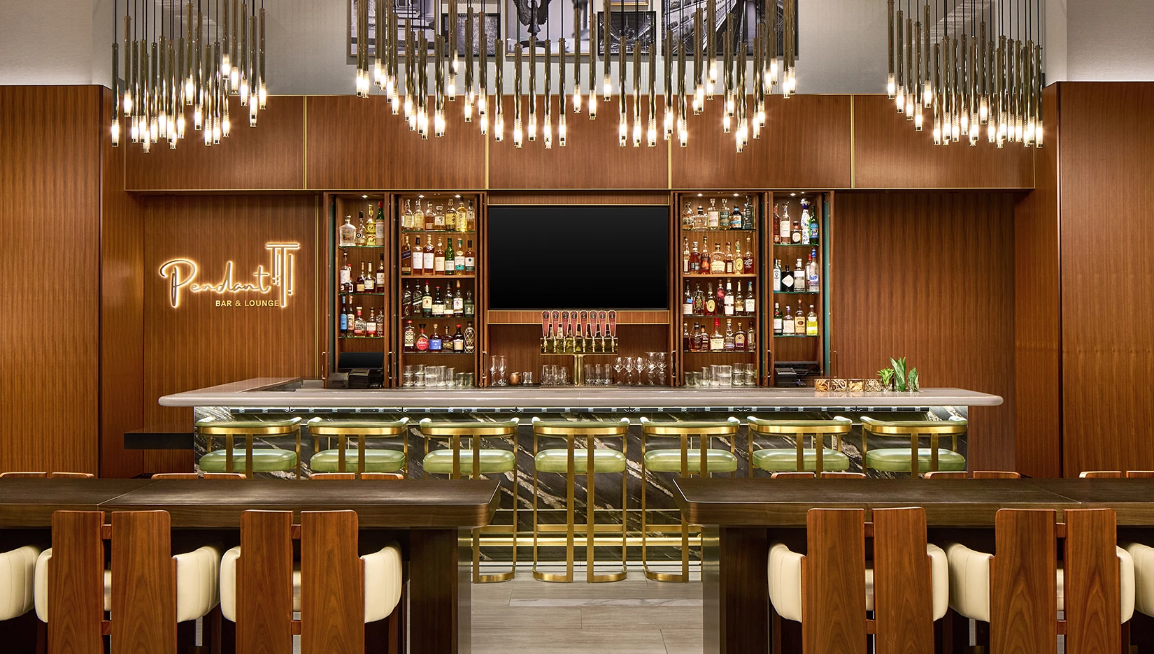 a bar with a television and shelves