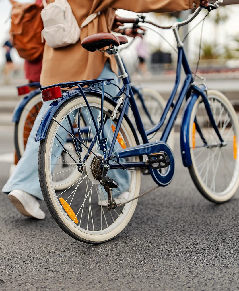 a blue bicycle with white wheels