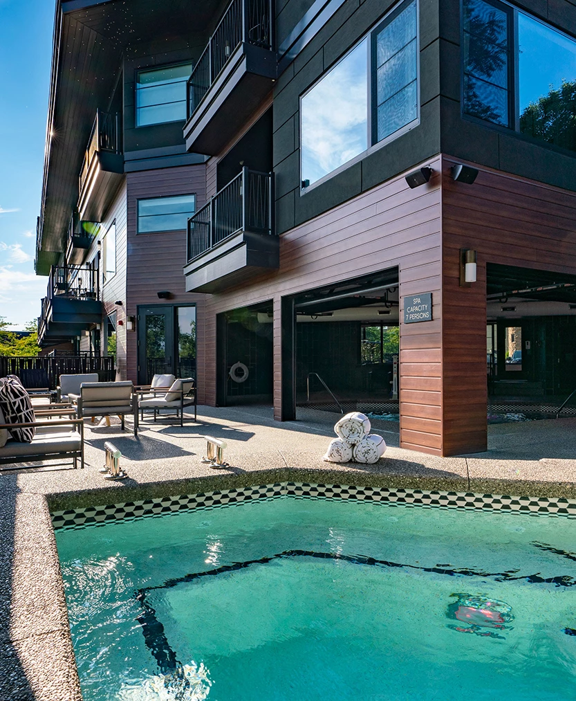 a pool in front of a building