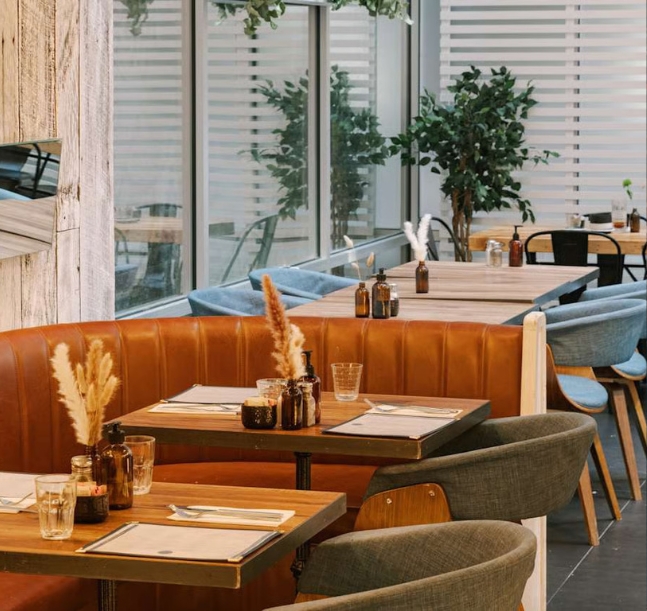 a restaurant with tables and chairs