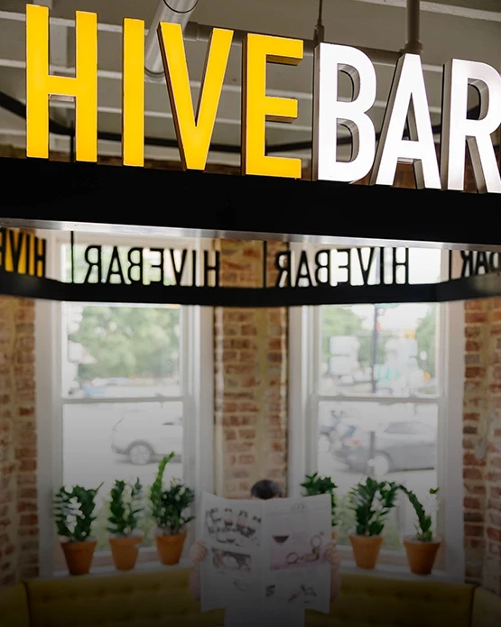 a sign above a table