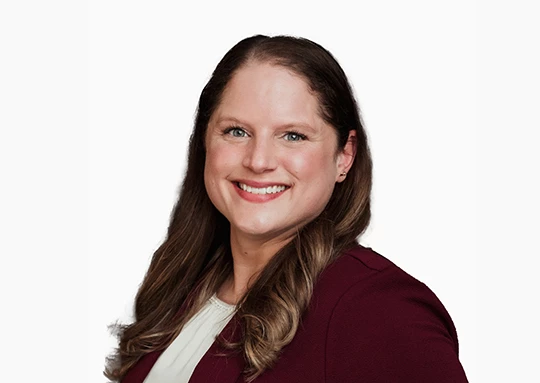 a woman smiling at the camera