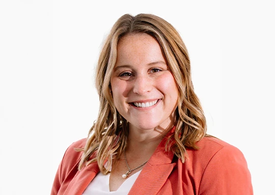 a woman smiling at the camera