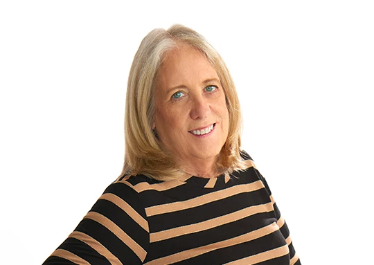 a woman smiling at the camera