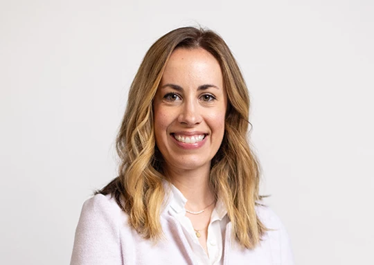 a woman smiling at camera