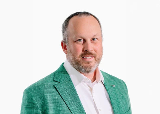 a man in a green jacket