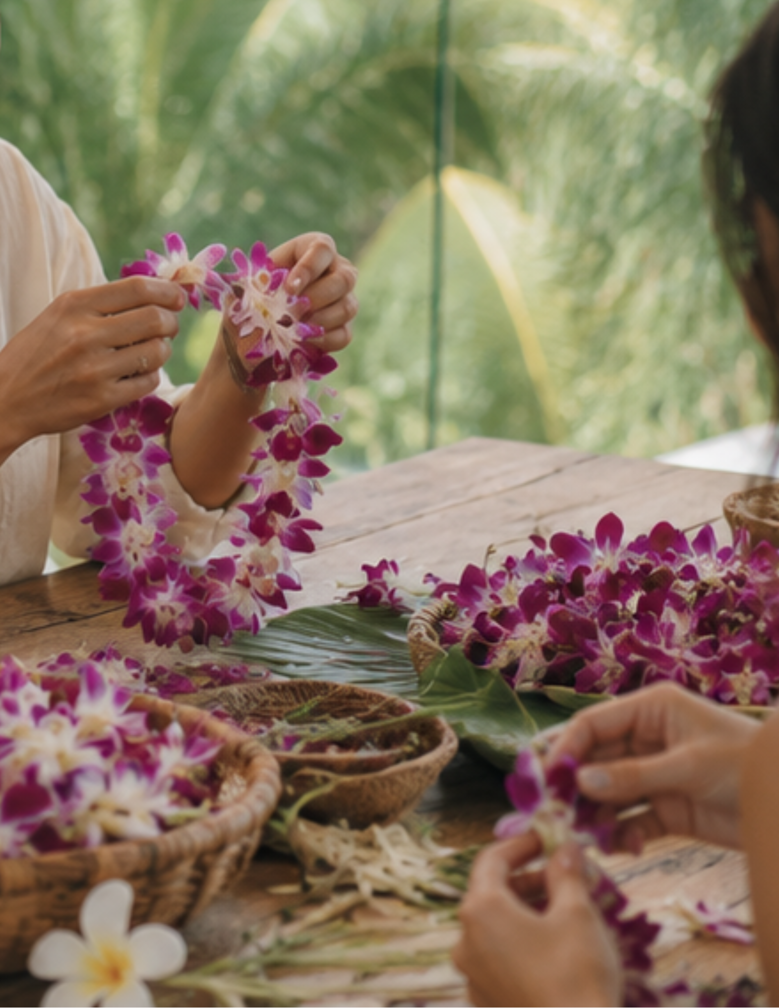 a woman making a lei