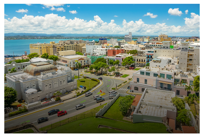 a city with cars and buildings