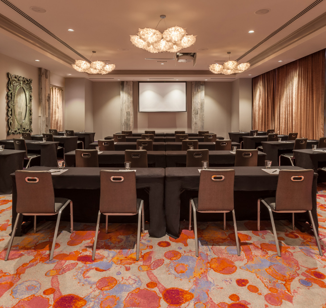 a room with tables and chairs