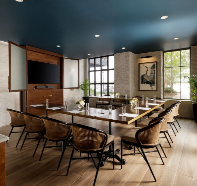 a room with a table and chairs