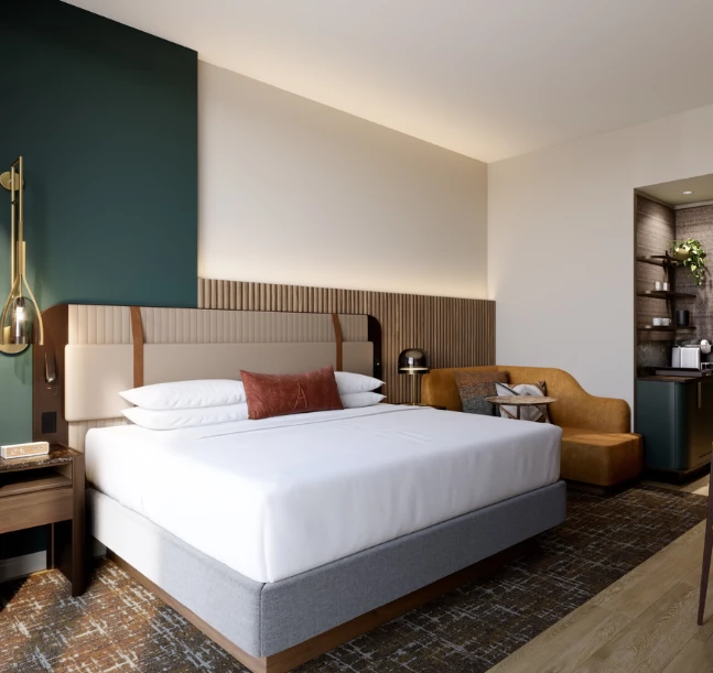 a room with a bed and a chair