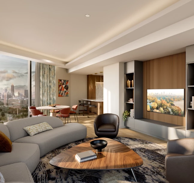 a living room with a large round table and chairs