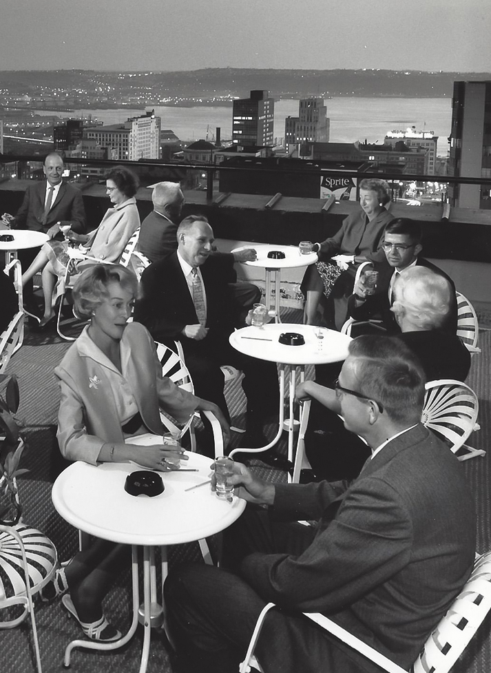 a group of people sitting at tables