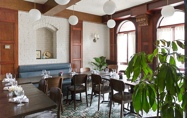 a room with a table and chairs