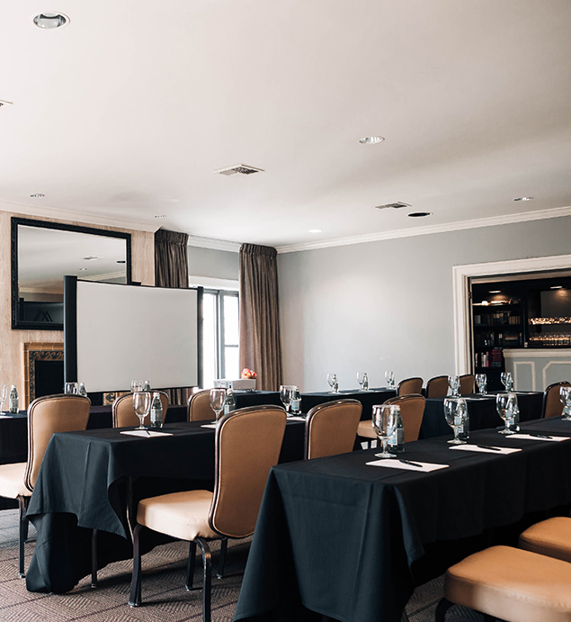a room with tables and chairs