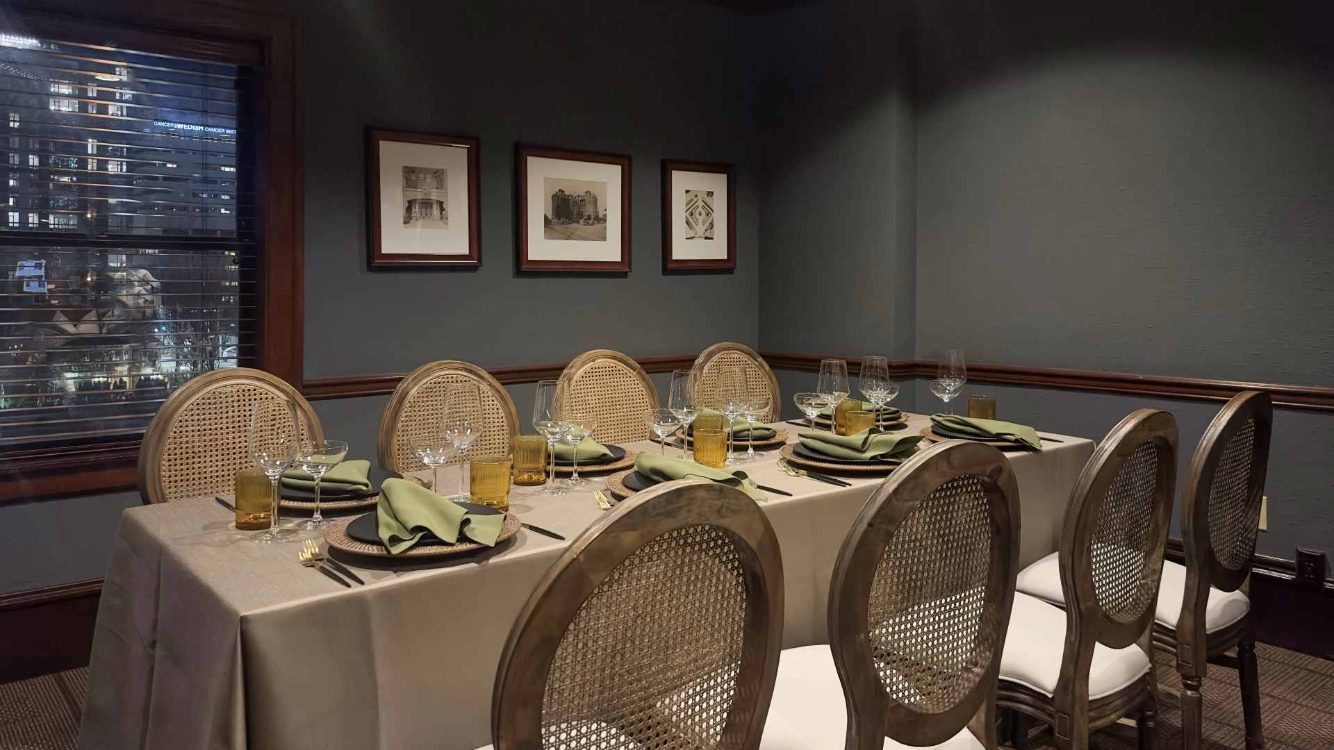a dining room with a table set for a meal