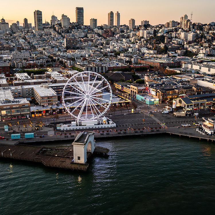 a city with a ferris wheel