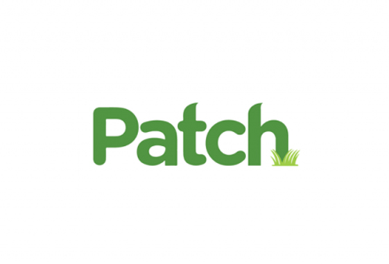 a logo with green letters