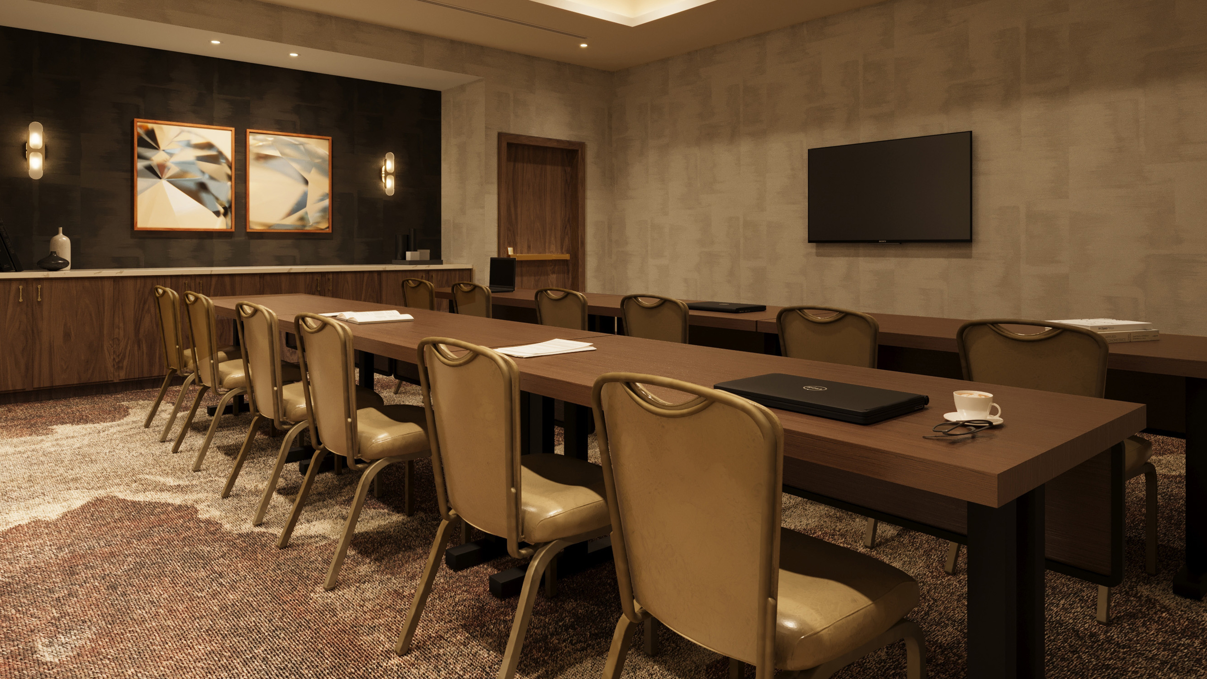 a room with a long table and chairs