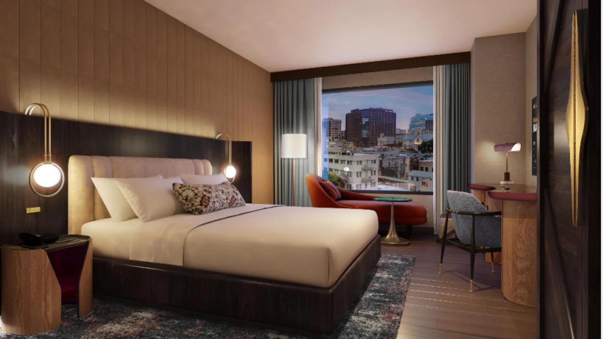 a bedroom with a large window and a bed