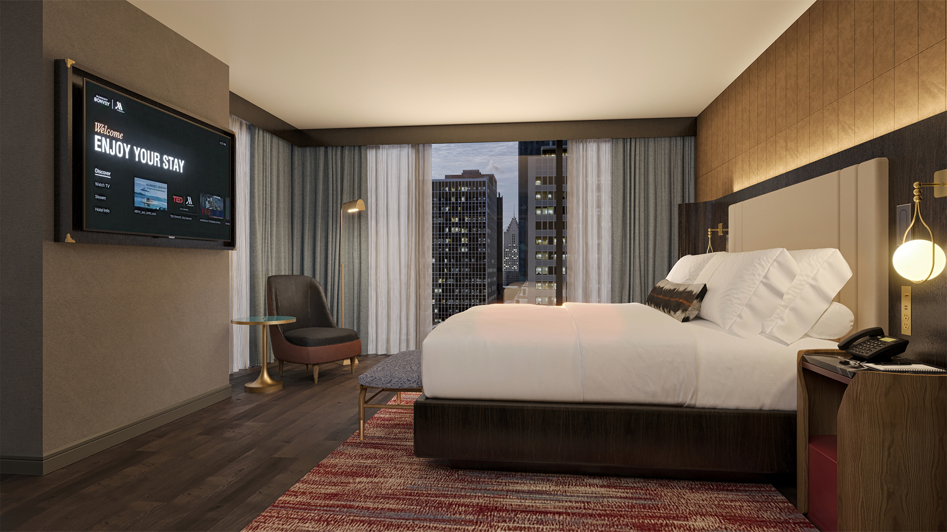 a room with a bed and a television