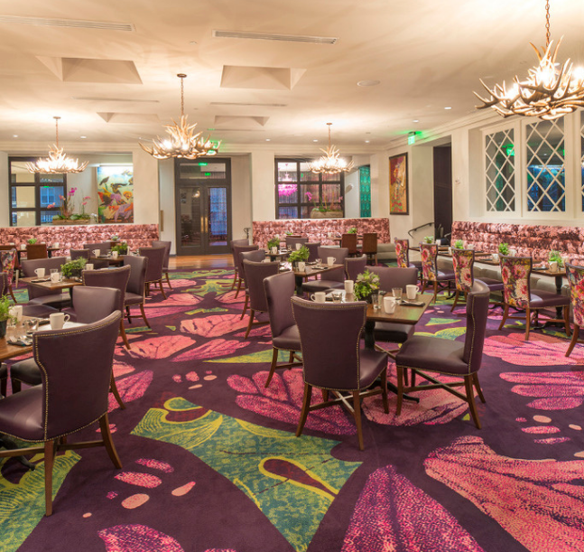 a room with tables and chairs