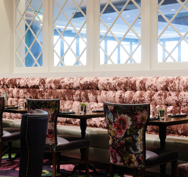 a restaurant with tables and chairs