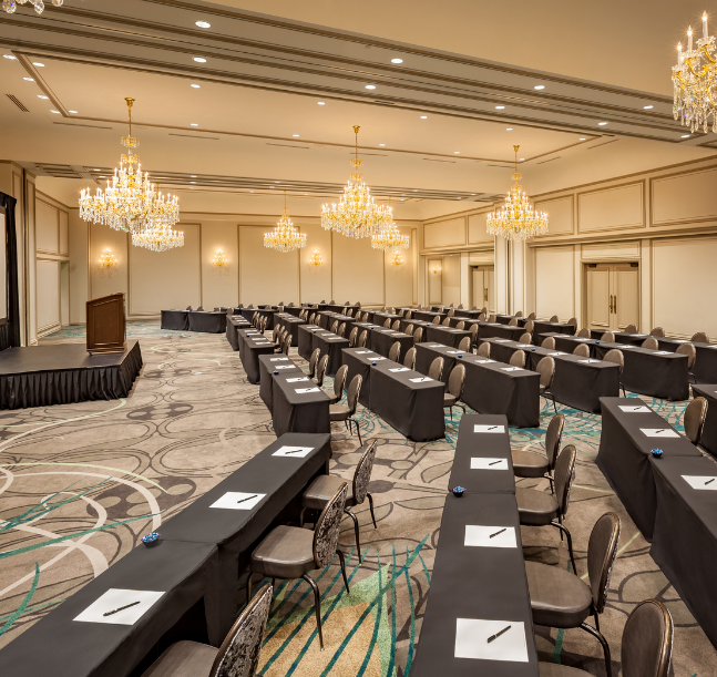 a large room with tables and chairs