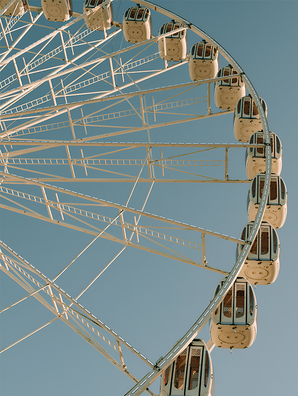 a ferris wheel with cabins