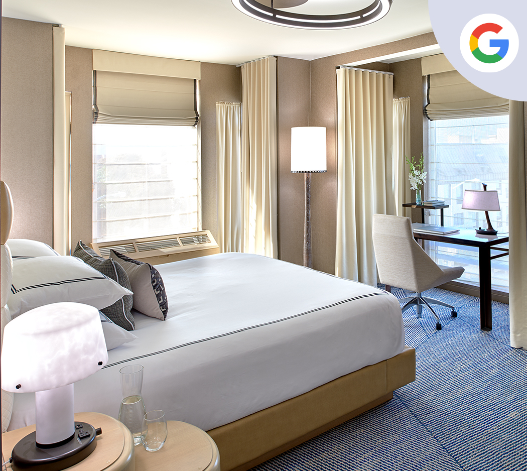 a bedroom with a bed and a desk