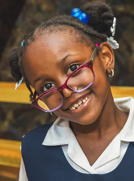 a girl smiling at the camera
