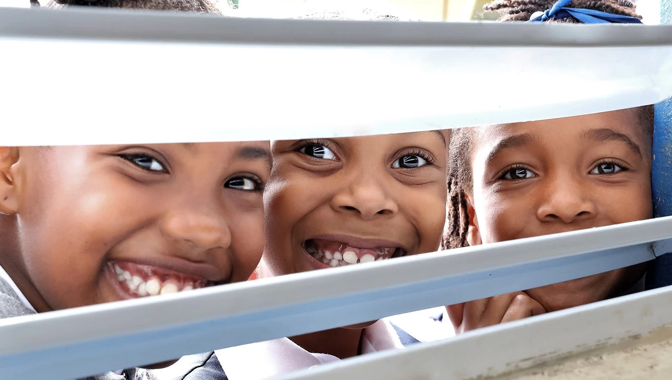 a group of children smiling