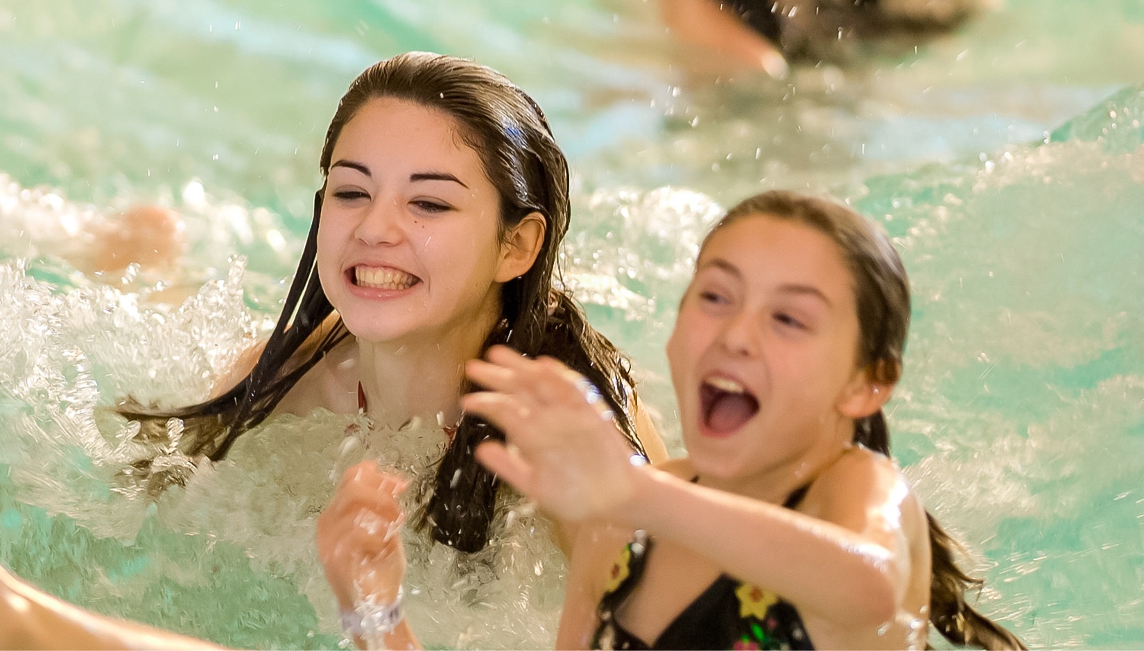 two girls in a pool